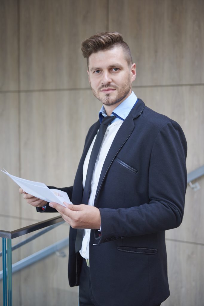 Man in suit in the company
